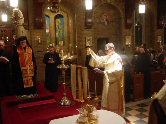 Deacon David and Archbishop Nathaniel at the altar during Great Vespers