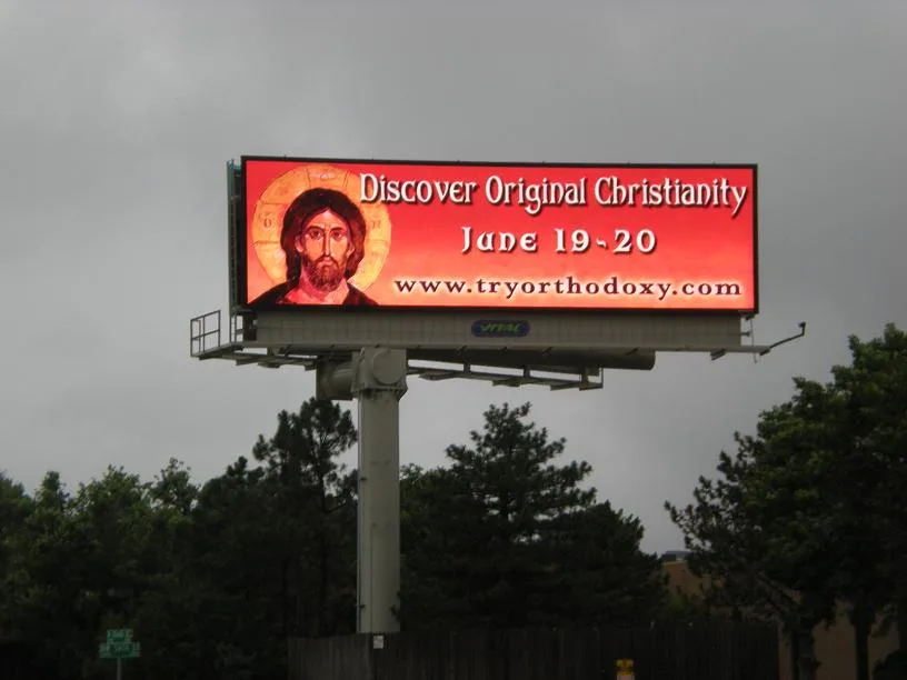 Roadside sign reading “Try Orthodoxy” outside St. Andrew House